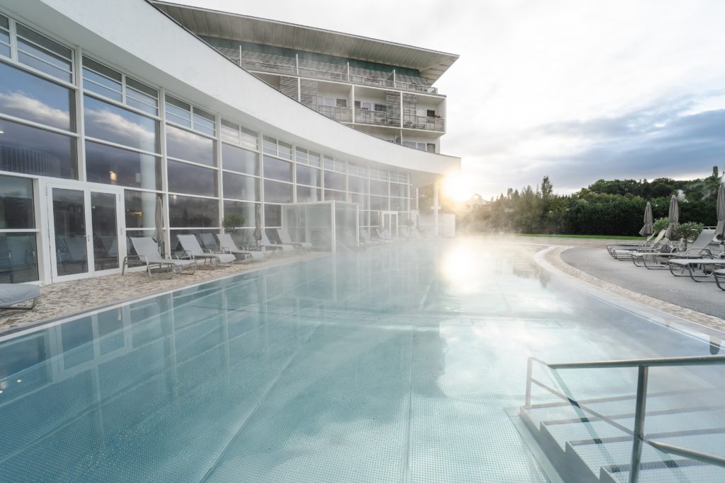 Steaming outdoor pool at REDUCE Hotel Vital