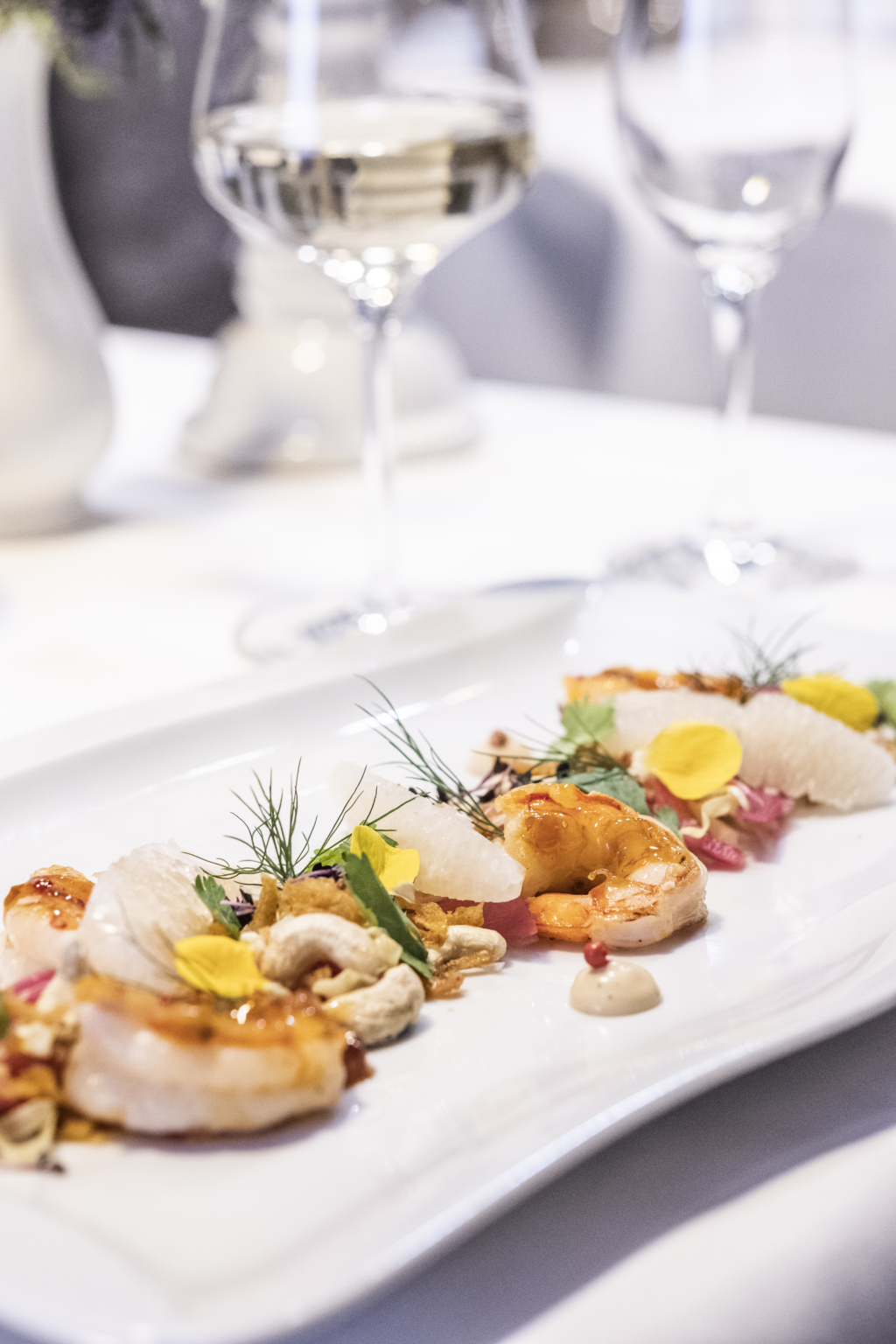 Gourmetgericht mit Garnelen aus dem Restaurant Glockenturm im Hotel Holzapfel